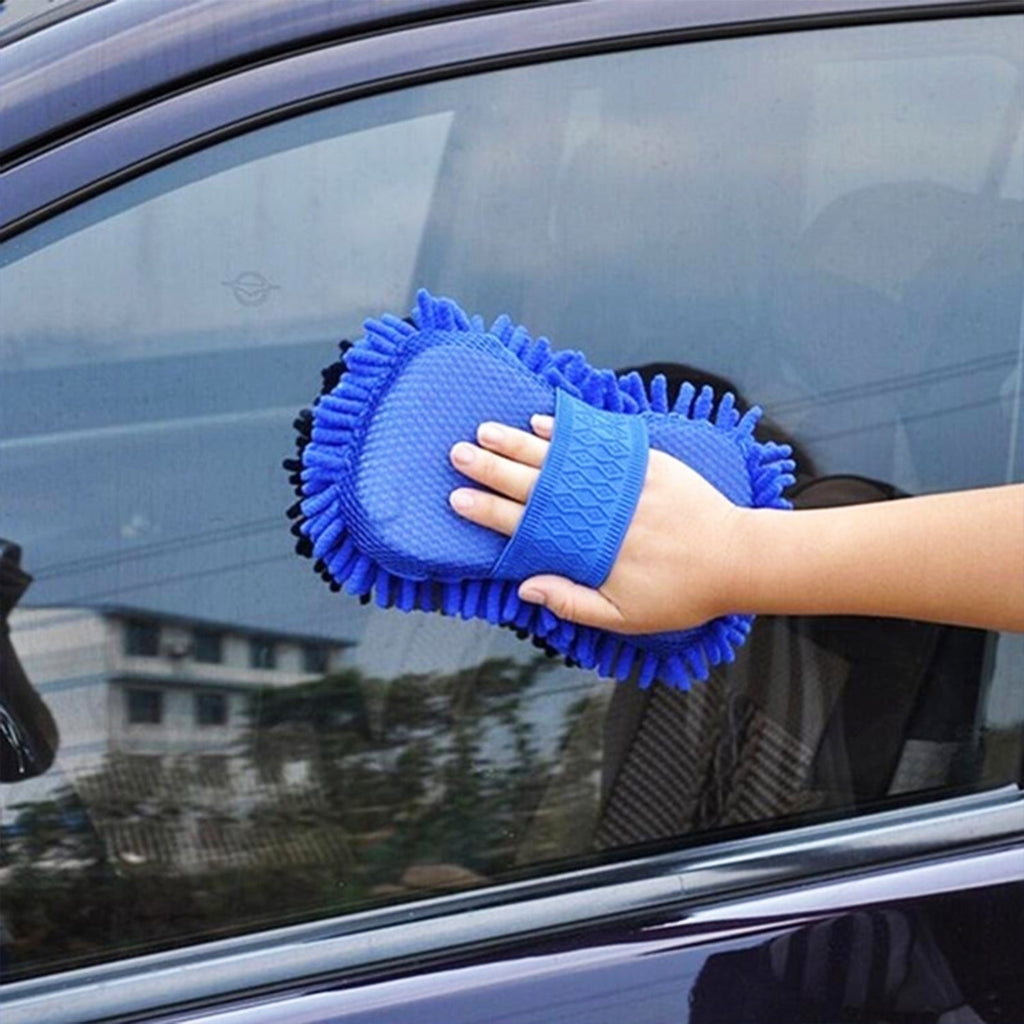 Person using a Microfiber Duster Mitt for effective household cleaning.