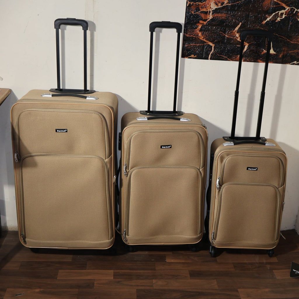 Brown soft side trolley luggage pieces stacked neatly for easy storage