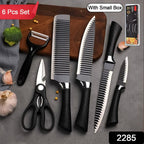Close-up of the sharp blades and ergonomic handles of the kitchen knives.