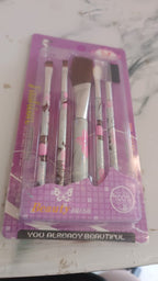 Makeup brush set with elegant floral handle design