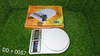 Stylish digital kitchen scale with a wide weighing platform.