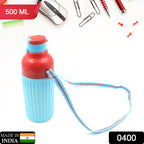 Person holding a 500ml insulated water bottle with its practical dori carry strap.
