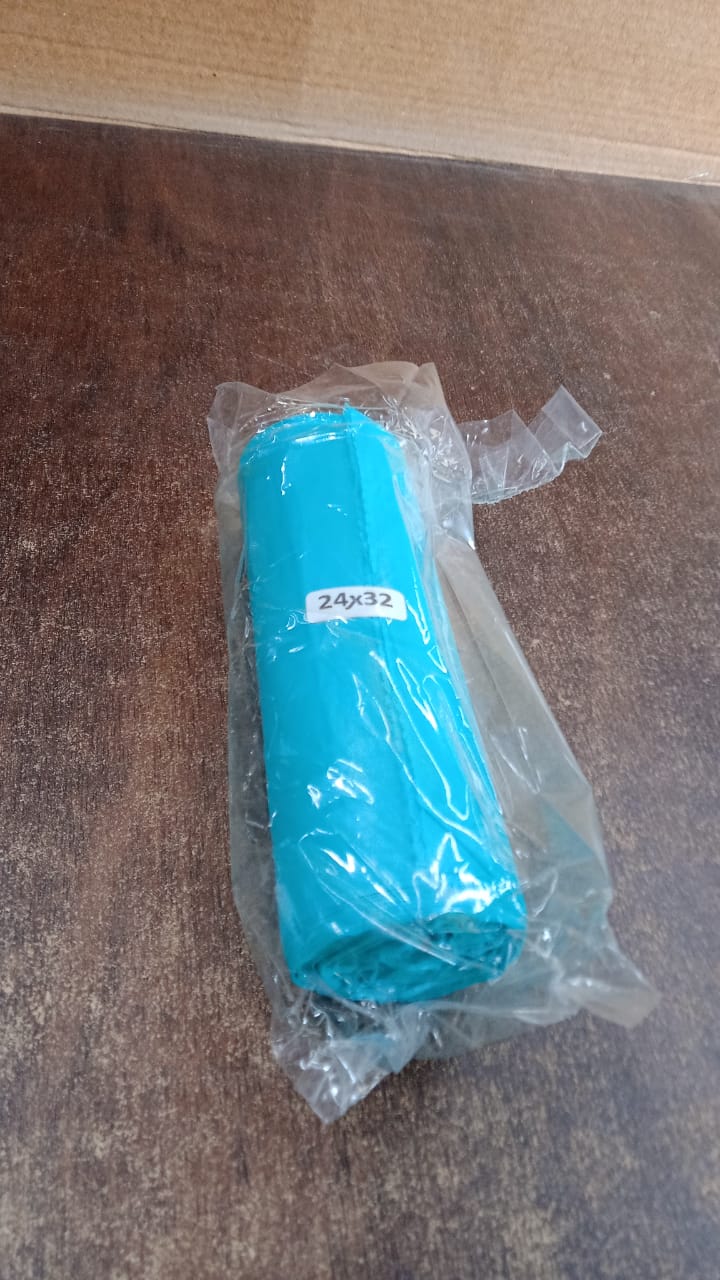Assortment of colored biodegradable garbage bags, showcasing various sizes for different needs.