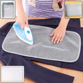 Heat-resistant ironing mesh press cloth lying on a garment to protect fabric during ironing