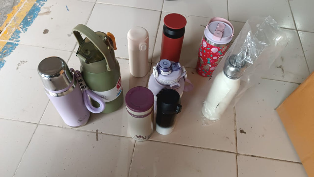 Stainless steel thermos bottle featuring leak-proof cup lid