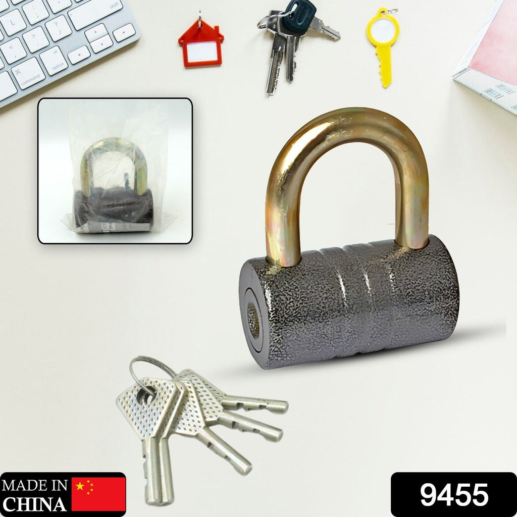 Side view of the robust black iron padlock, highlighting its sturdy construction.