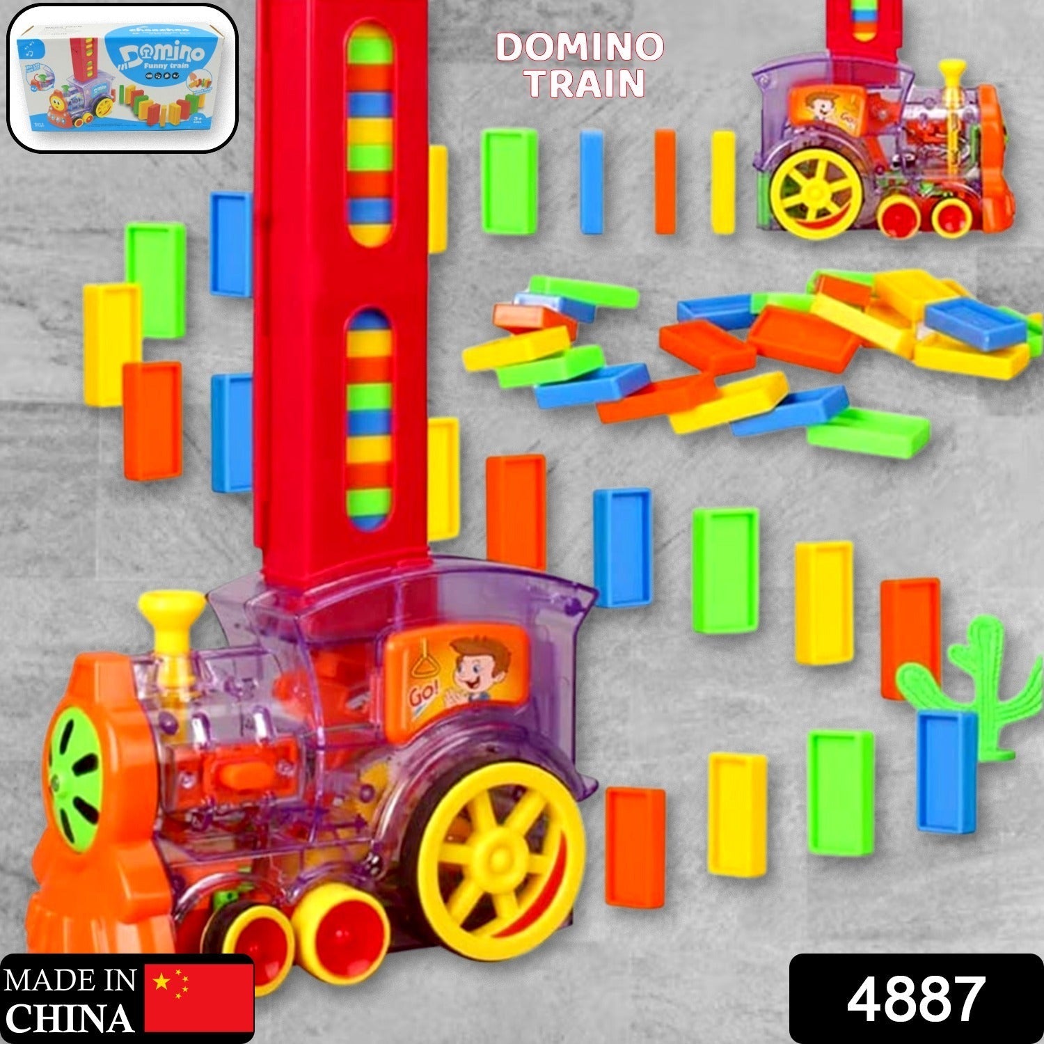 Child's hand interacting with the automatic domino train set in action.