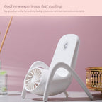 Detailed view of the fan's blades and protective grille for safe operation.