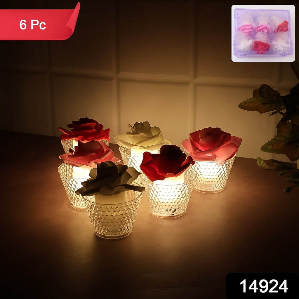 Close-up of flickering LED rose tealight candle creating warm ambiance