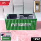Multi-compartment desk organizer used for holding stationery and office supplies.