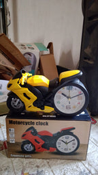 Retro Motorcycle Alarm Clock displayed on a light wooden table, enhancing the room's aesthetic with its novelty design.
