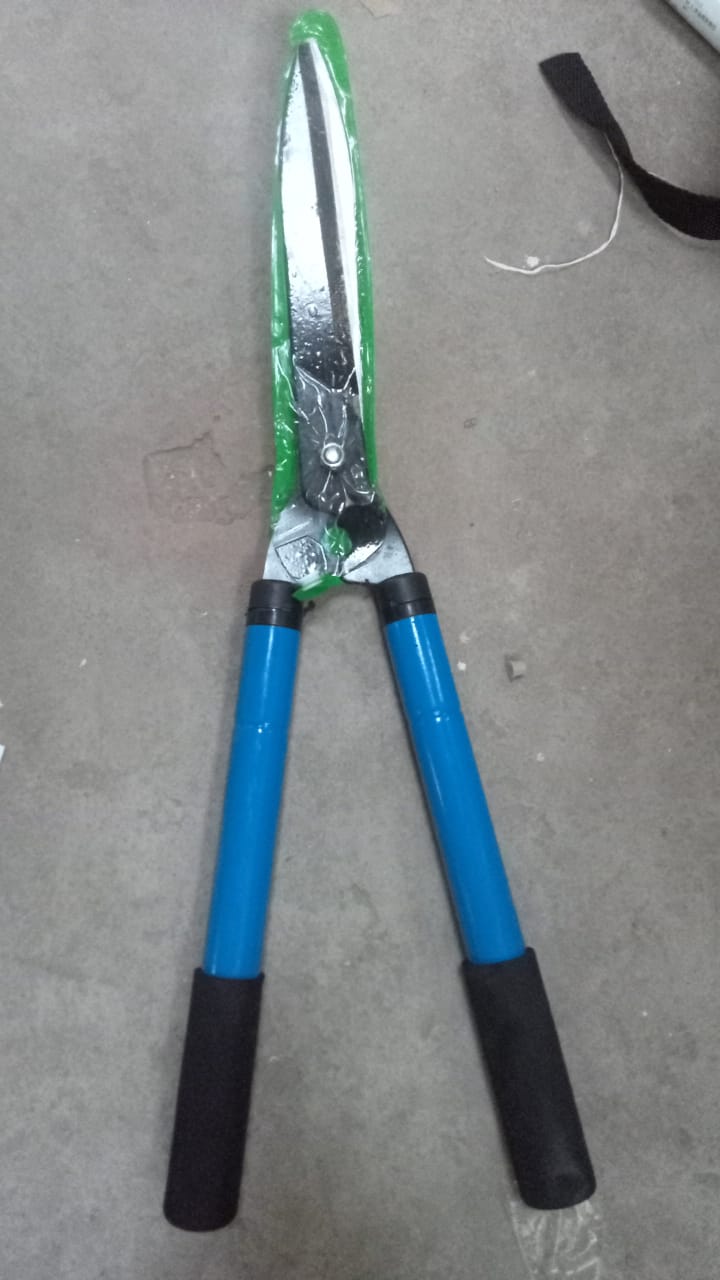 Adjustable hedge shear with sturdy handles for versatile trimming.