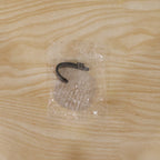 Minimalist transparent adhesive wall hook for versatile home use