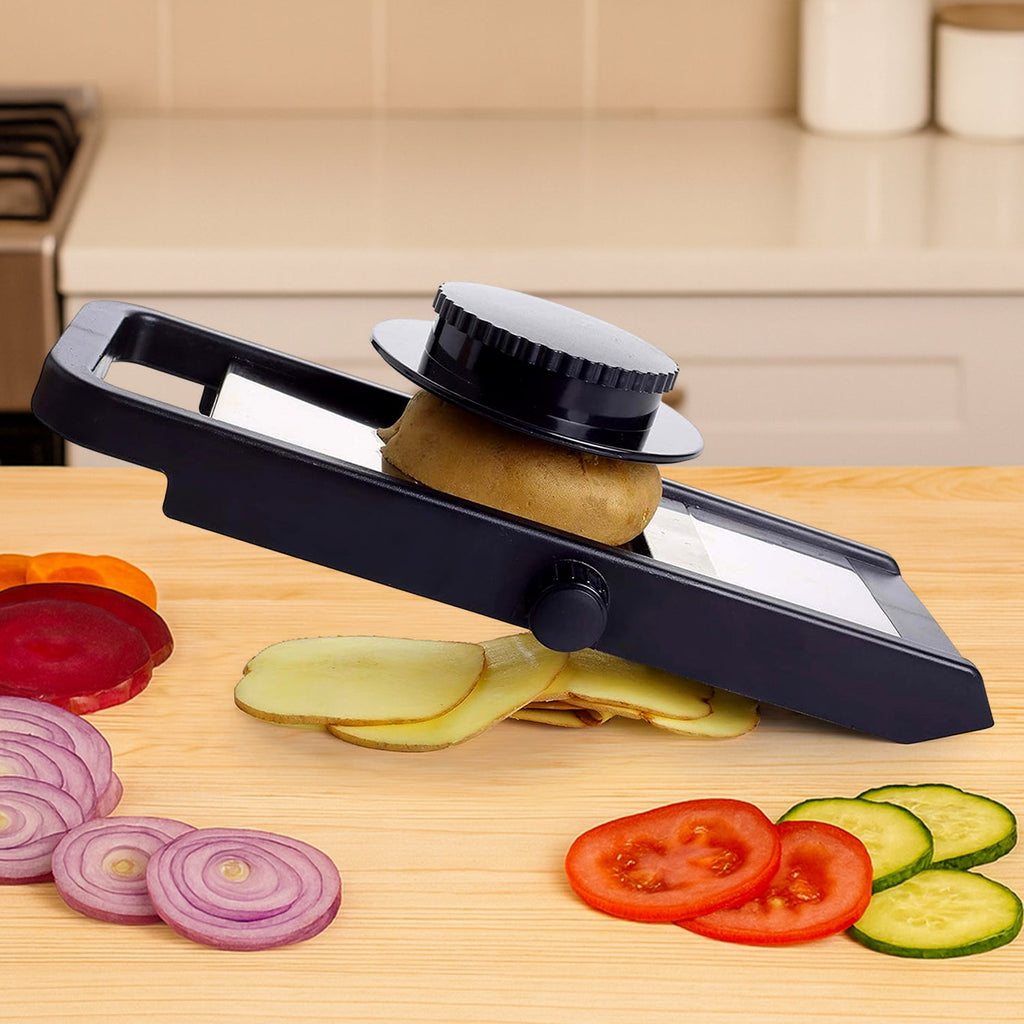 Adjustable fruit slicer with ergonomic handle on kitchen counter