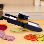 Adjustable fruit slicer with ergonomic handle on kitchen counter