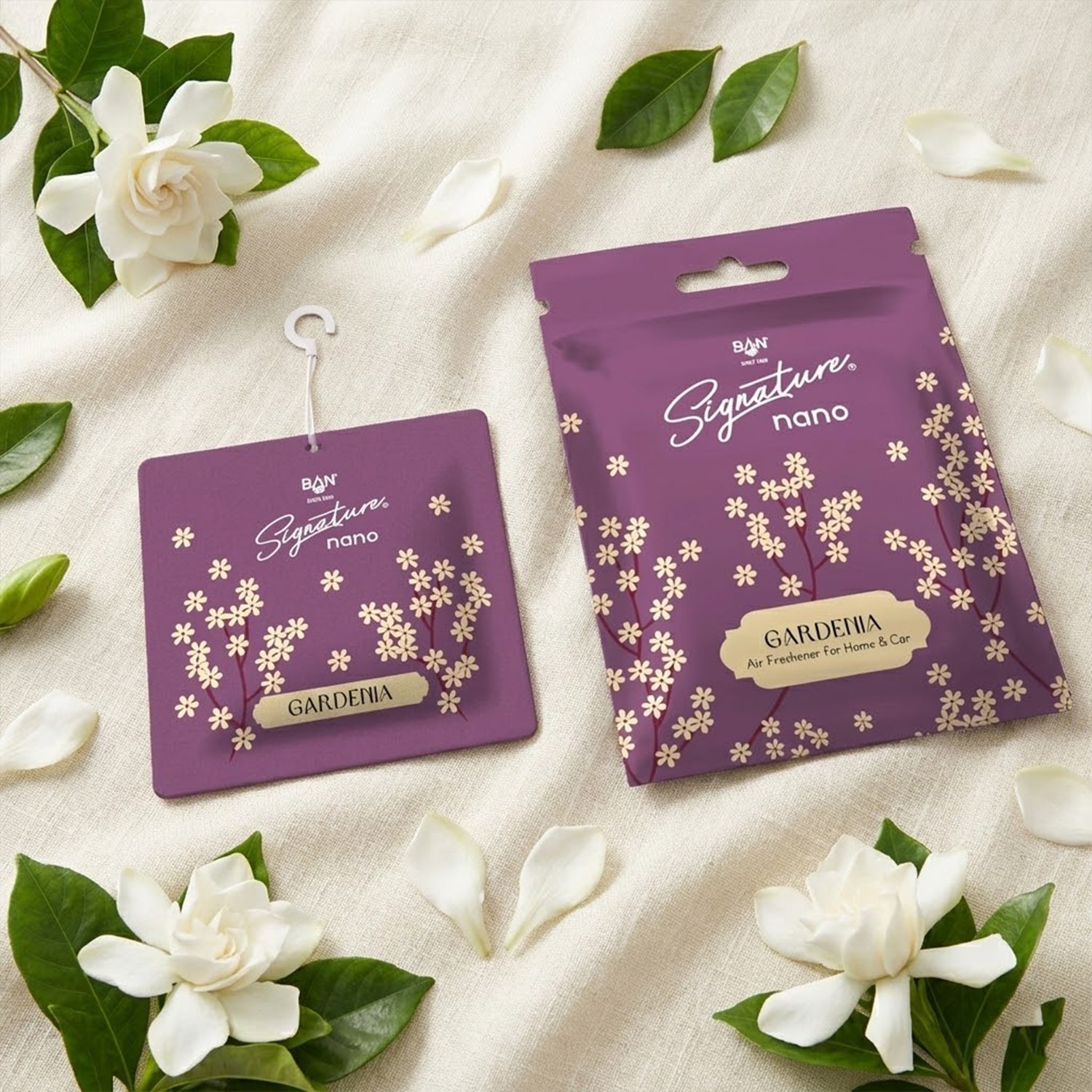 Gardenia air freshener sachet with floral design hanging indoors.