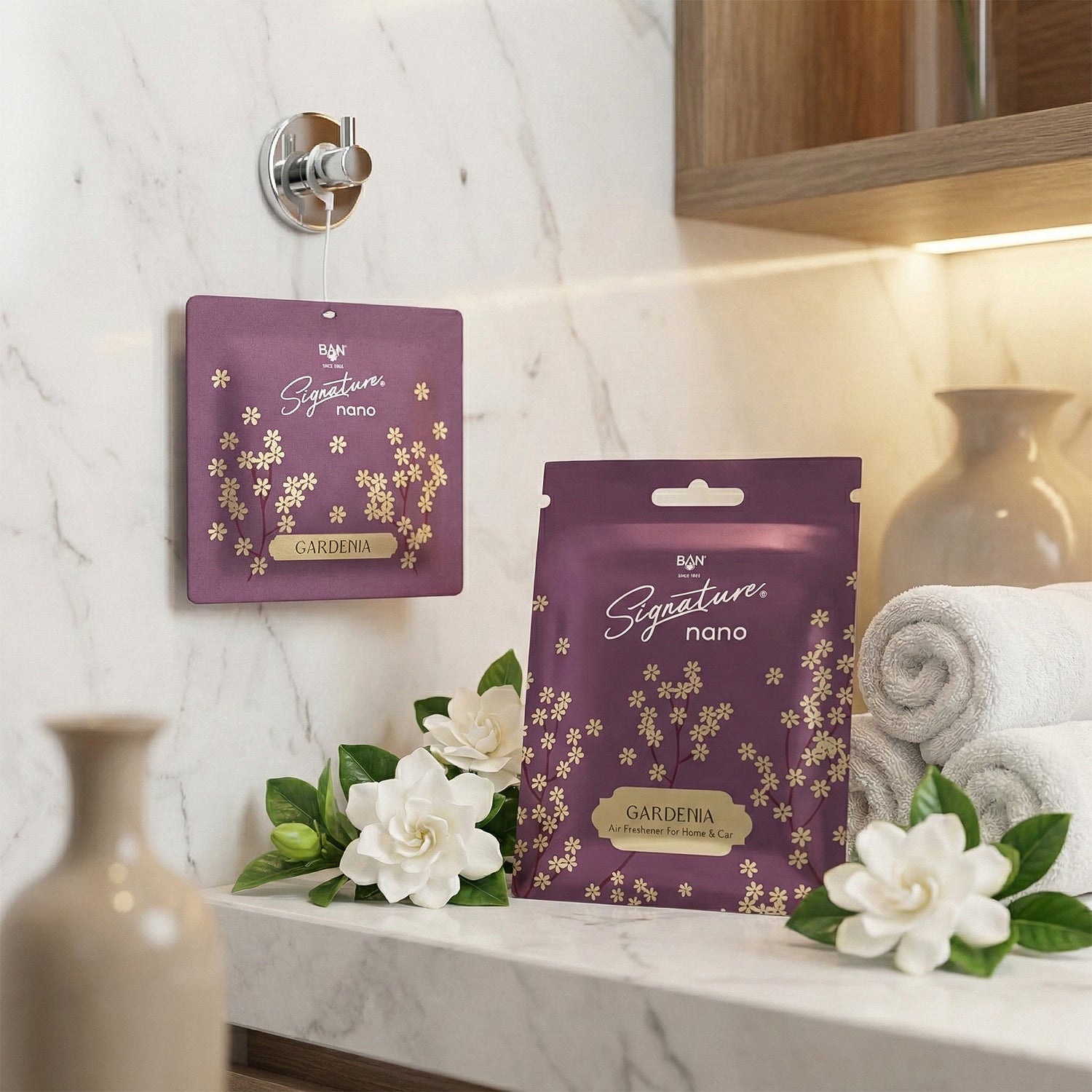 Hanging Gardenia fragrance sachet in a car interior for fresh scent.