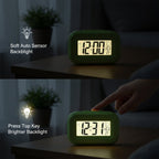 Digital alarm clock suitable for bedroom or office use