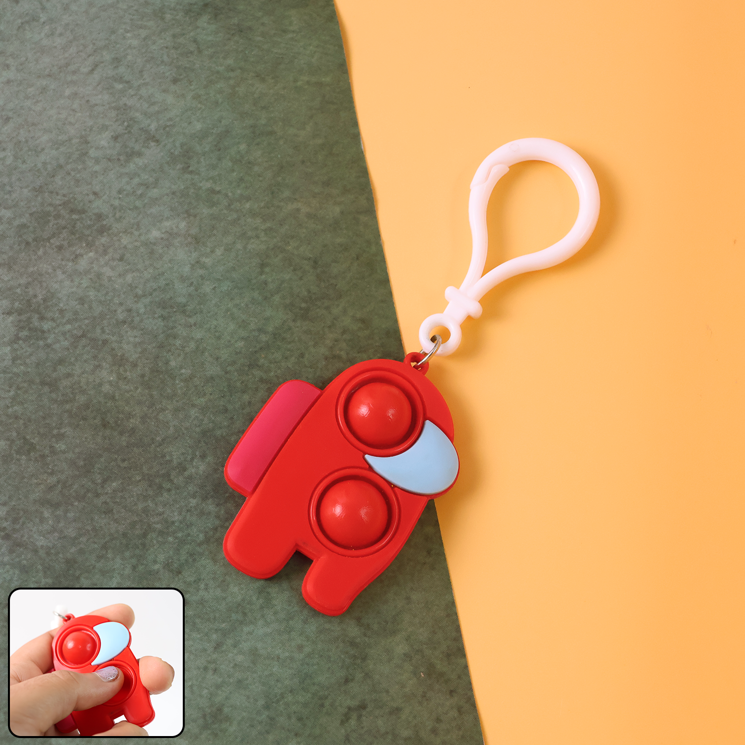 Pop-It Fidget Keychain in a mix of colours, with a clip hook, displayed against a clean background.