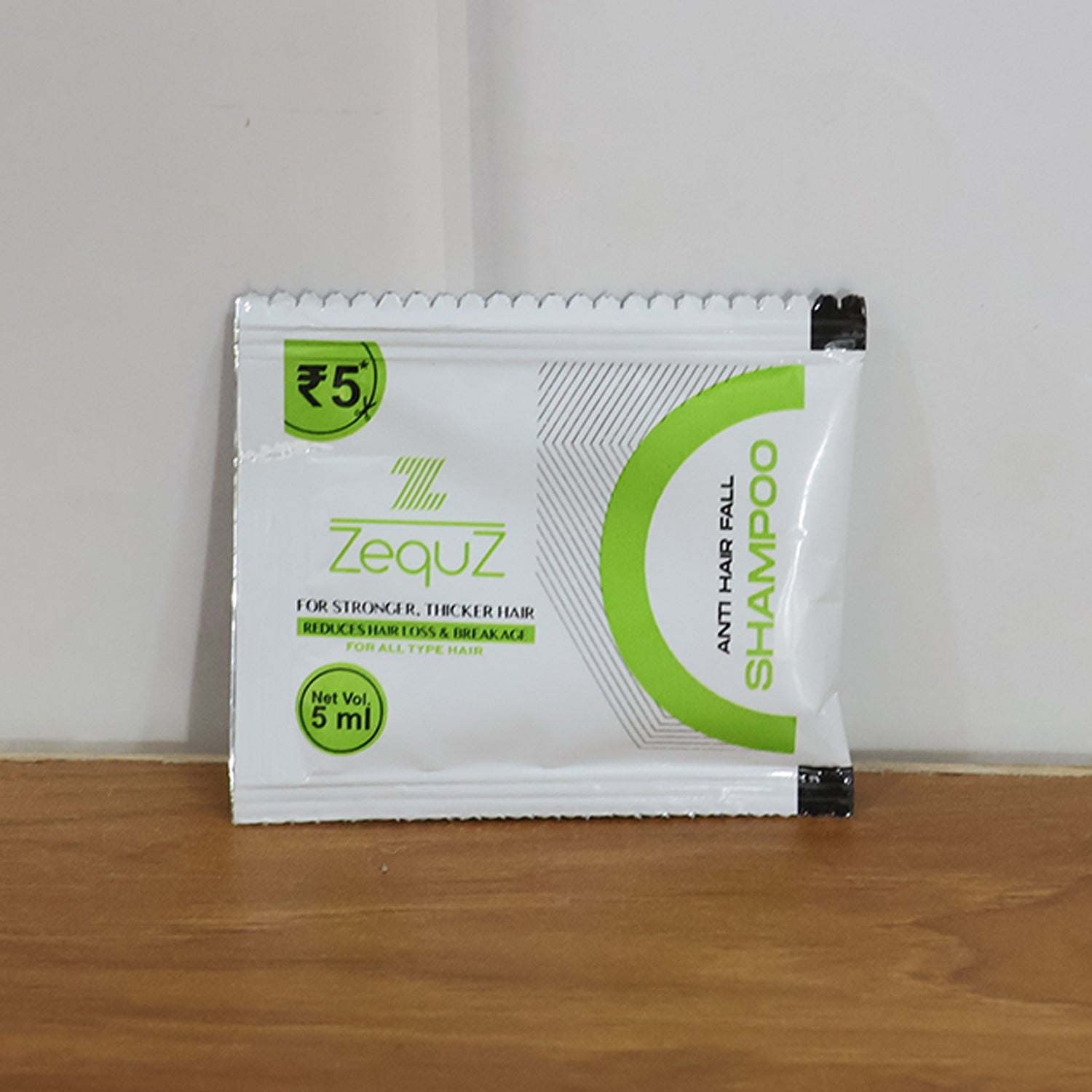 Zequz shampoo sachet designed to reduce hair breakage and hair loss