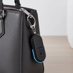Durable emergency alarm keychain with quick activation feature