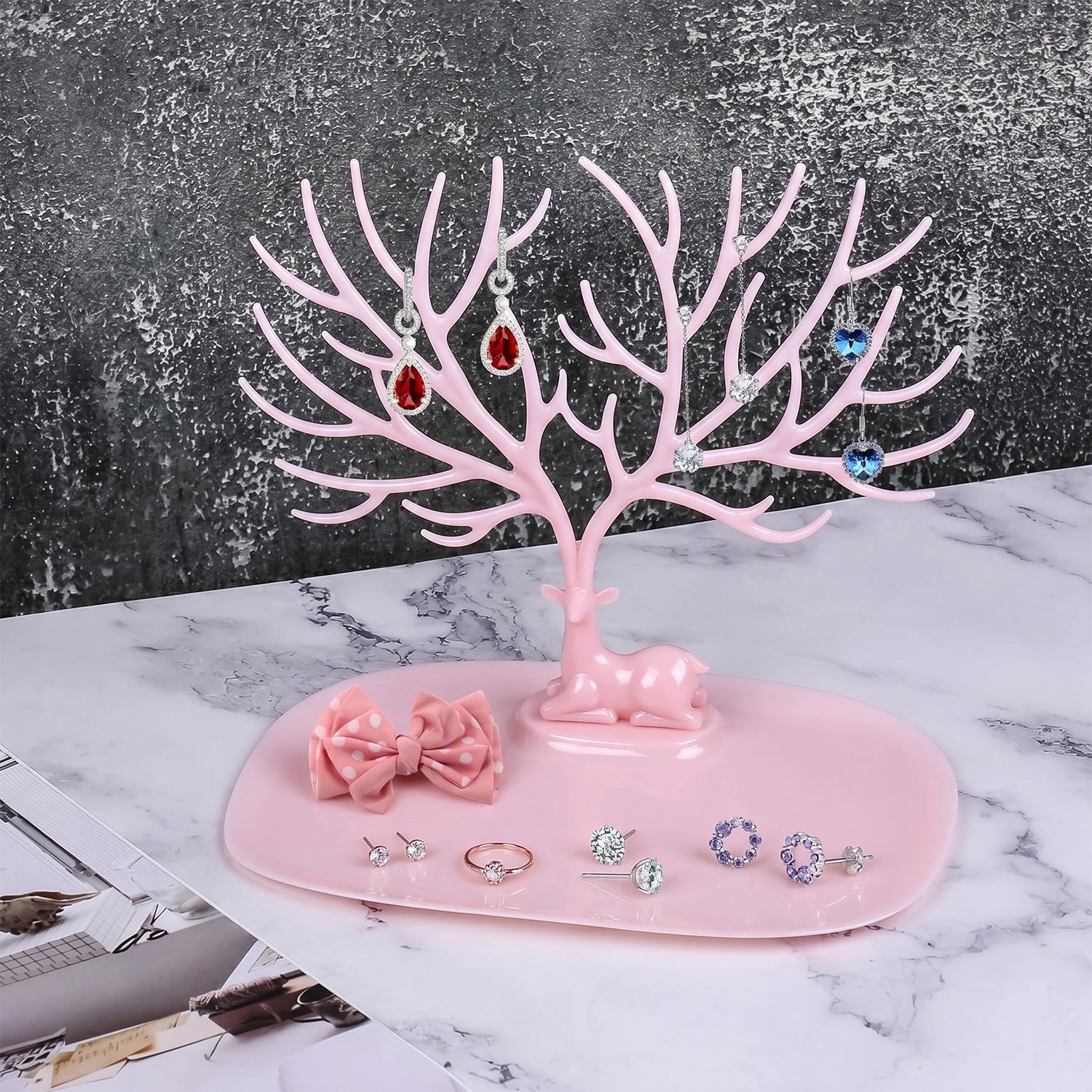Full view of pink deer jewelry organizer stand, India
