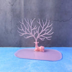 Detailed view of pink deer jewelry organizer stand, India