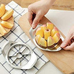 Heavy duty apple cutter with ergonomic handles for kitchen convenience