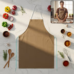 Classic black chef apron featuring adjustable neck strap