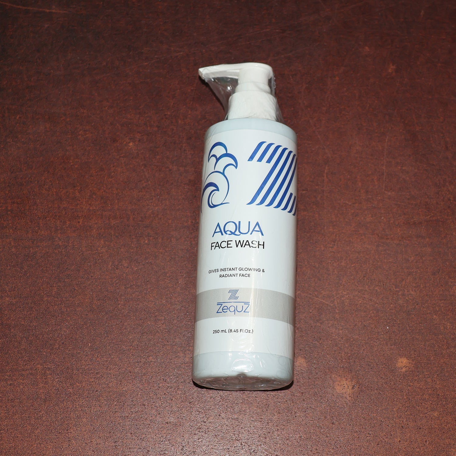Lifestyle image of Hydrating Aqua Face Wash bottle in bathroom setting