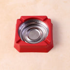 Side view of heat-resistant ashtray displaying stable base design