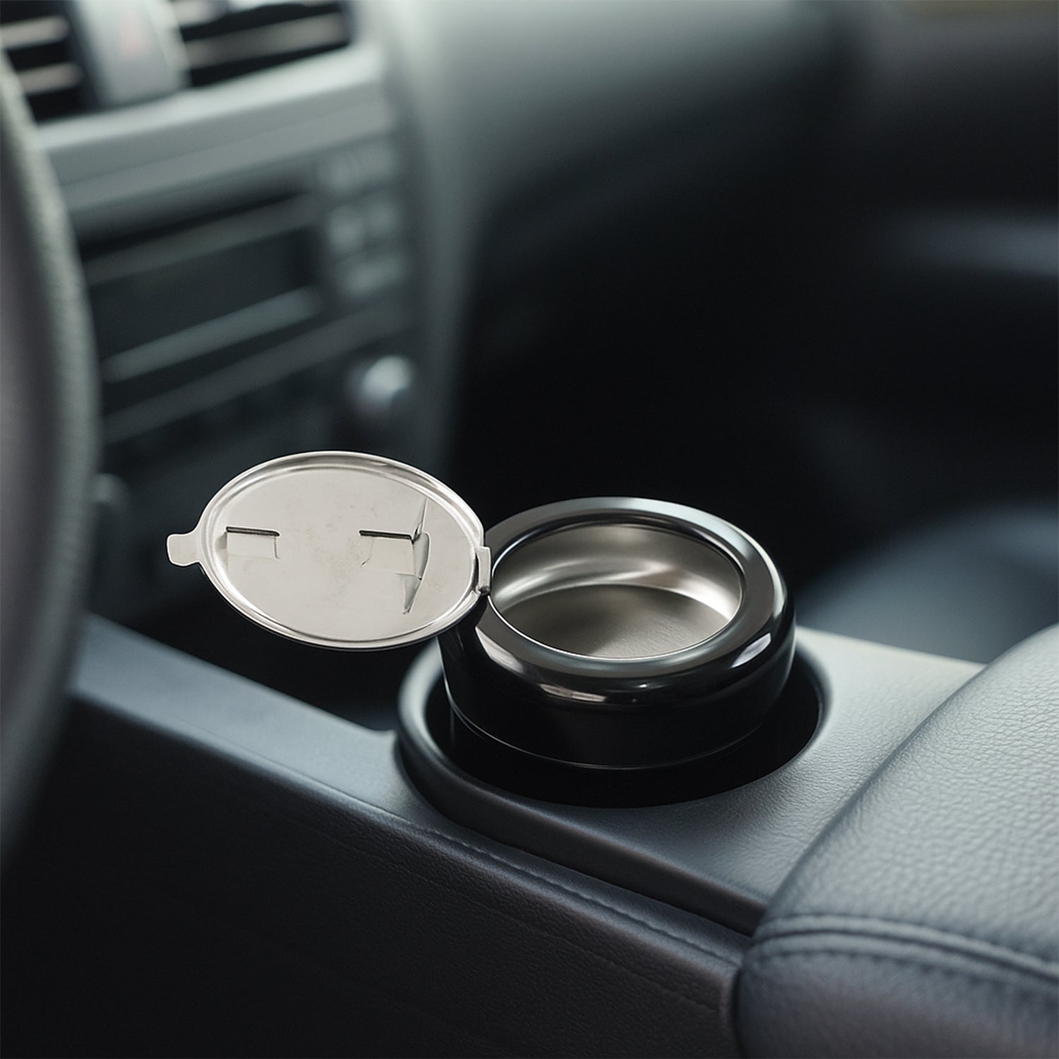Close up of smokeless round ashtray capturing smoke efficiently