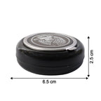 Tabletop ashtray showing deep container for ash collection