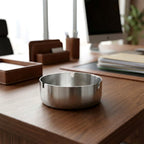 Tabletop cigarette ashtray placed on table, ideal for indoor use