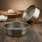 Stainless steel chalni used for straining and sifting dry ingredients