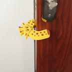 Side profile of the door stopper, showing its low-profile wedge shape.