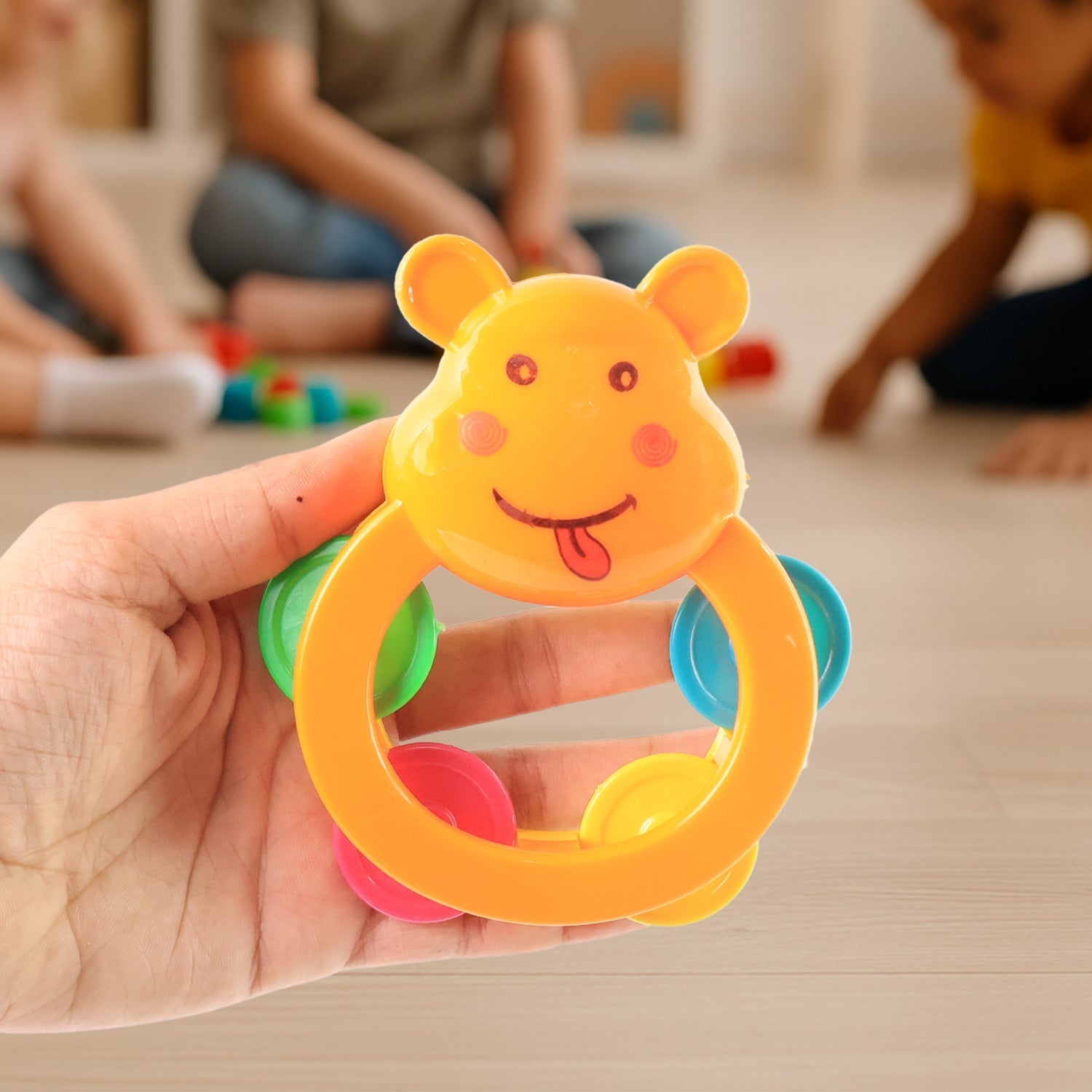 Baby rattle set with assorted shapes and textures for tactile exploration