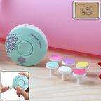 Baby electric nail trimmer with interchangeable grinding heads laid out