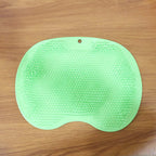 Lifestyle image using the silicone bath massage cushion in bathroom