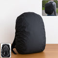 FERVENT waterproof backpack rain cover securely fitted on a black trekking backpack.