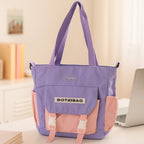 Versatile shoulder tote bag with adjustable strap in soft material