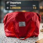 Top view of red travel carry bag demonstrating spaciousness