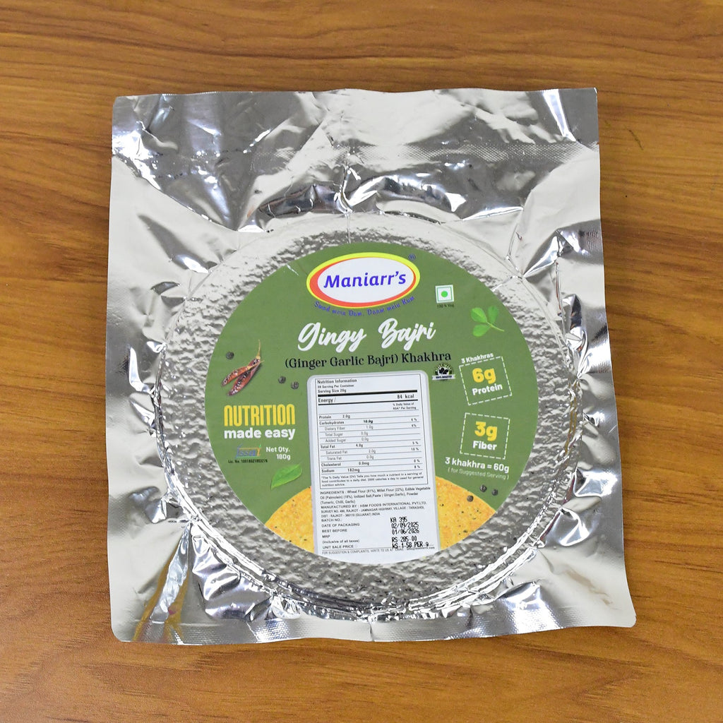 Lifestyle shot: Maniarr's Bajri Khakhra on a tray with tea, ideal for evening snacks.