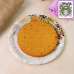 Crispy Maniarr's Bajri Khakhra with ginger garlic flavor on a white plate, golden texture visible.