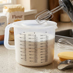 Measuring storage container with ergonomic handle