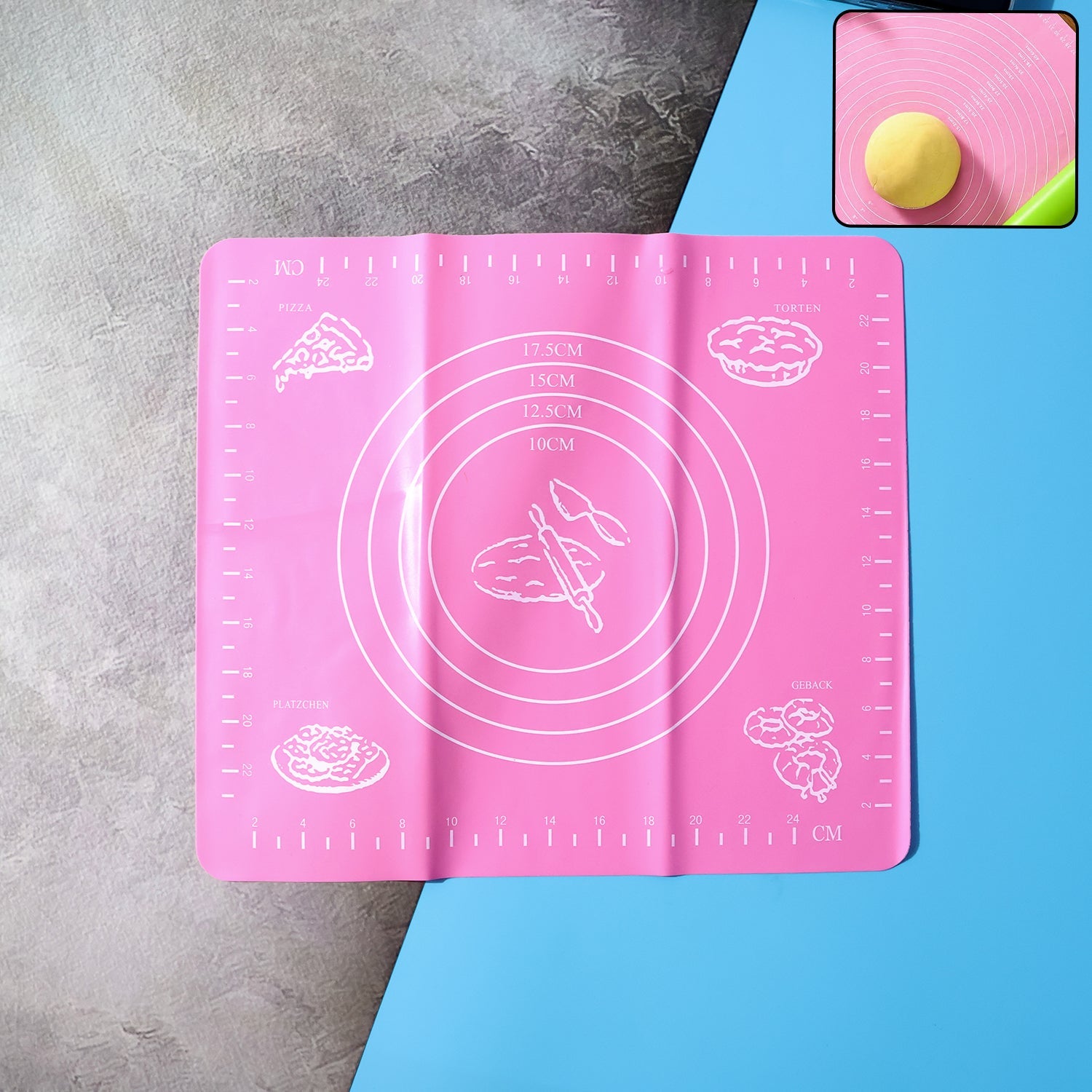 Non-stick silicone baking mat with measurement guides on a counter.