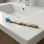 Angled view of sustainable wooden toothbrush