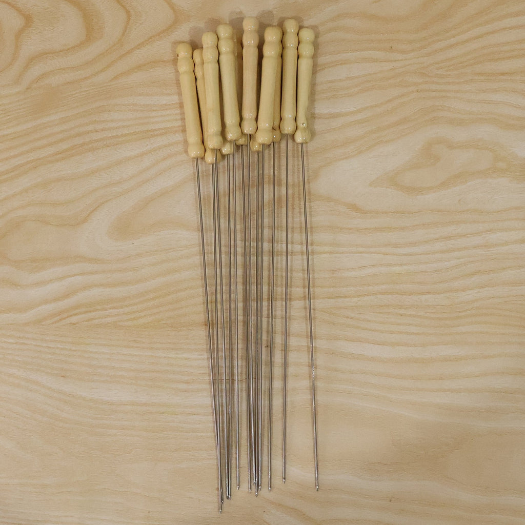 Skewers with stainless steel sticks and wooden handles for grilling cooking