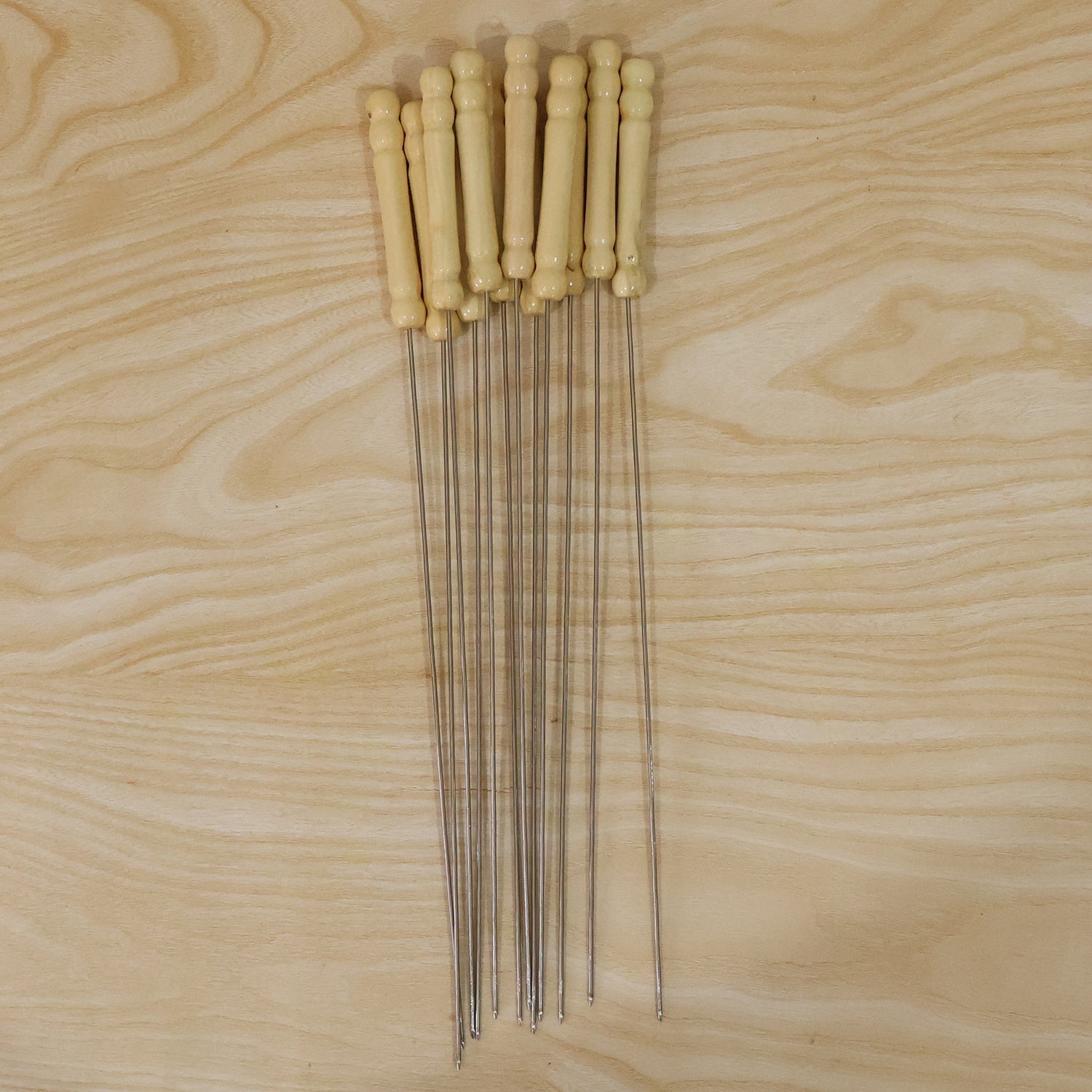 Skewers with stainless steel sticks and wooden handles for grilling cooking