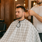 Reusable hair cutting cape ideal for home and salon use